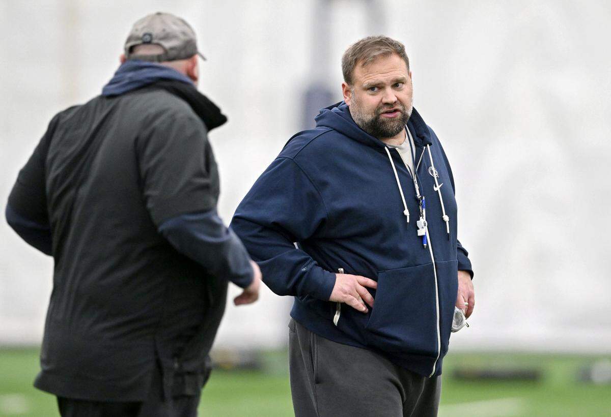 Penn State offensive coordinator Andy Kotelnicki talks to tight ends coach Ty Howle during practice on Friday, Dec. 27, 2024 at Holuba Hall as the team prepares for the Fiesta Bowl.