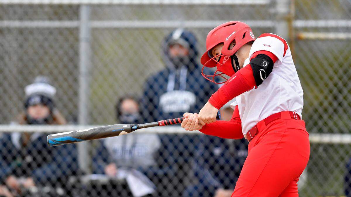 Bellefonte’s Sara DeHaas hits an out of the park homer that scored three runs in the first inning of the game against Philipsburg-Osceola on Friday, April 16, 2021.
