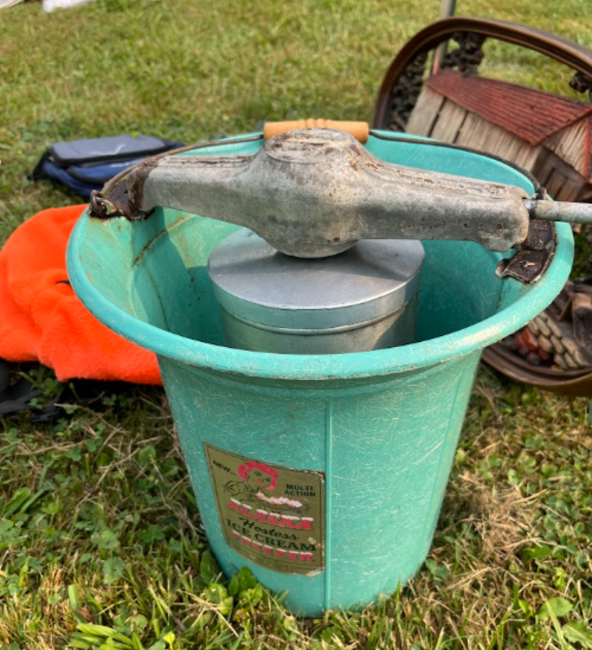 A 1950s-era hand-crank ice cream maker for sale in Karthaus during the 100 Mile Yard Sale on Friday, July 17, 2026.