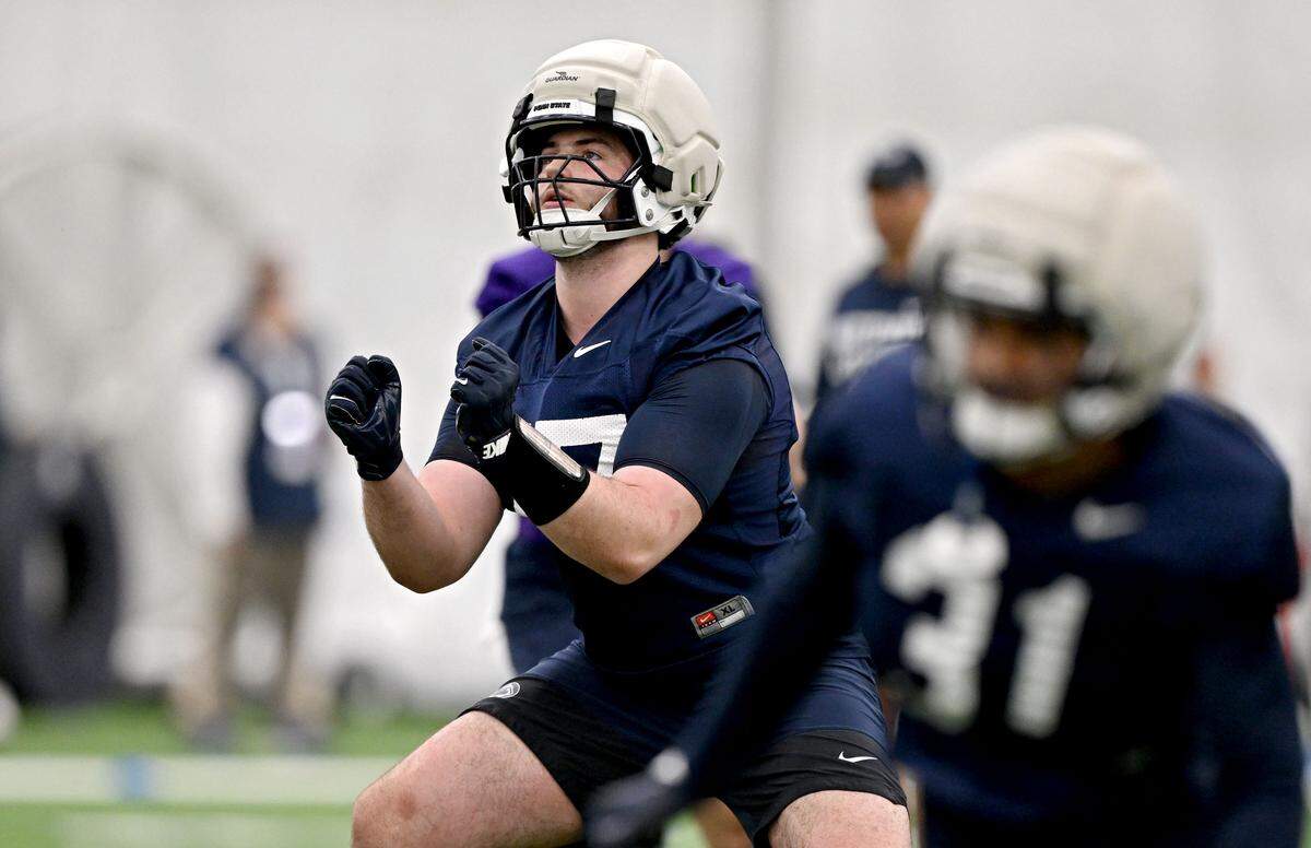 Penn State offensive lineman Owen Aliciene runs a drill during spring practice on Thursday, March 26, 2026.  