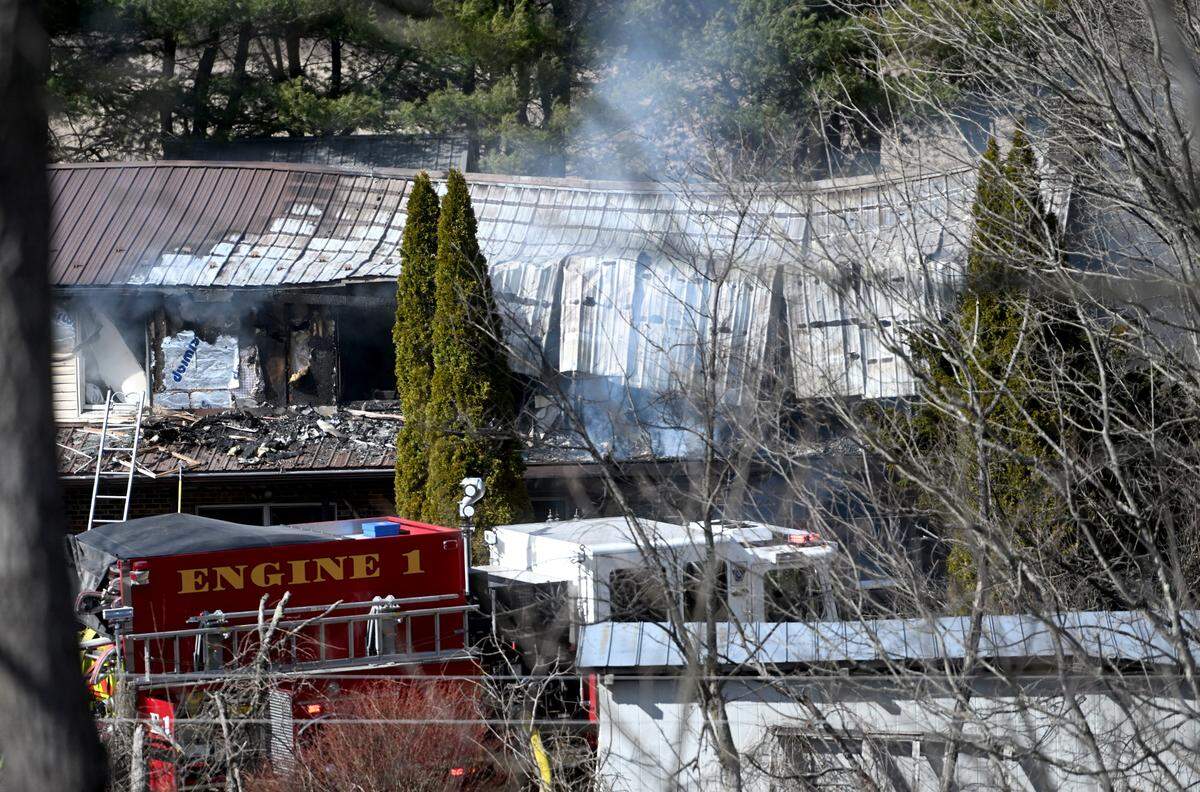 Firefighters respond to a house fire on Armagast Road in Benner Township on Thursday, March 16, 2023.