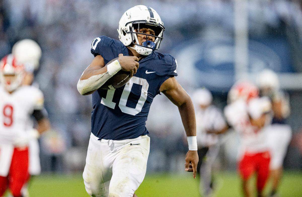 Penn State running back Nick Singleton runs for a touchdown during the game against Maryland on Saturday, Nov. 12, 2022.