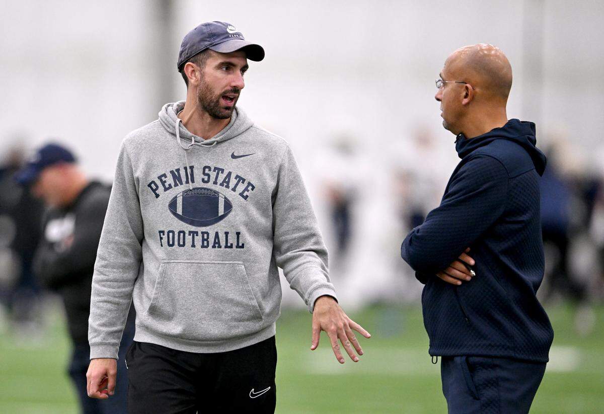 Penn State quarterbacks coach Danny O’Brien talks to head coach James Franklin during practice on Wednesday, Oct. 2, 2024.  