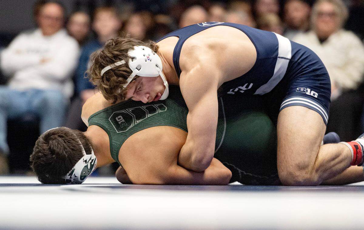 Penn State’s Levi Haines controls Michigan State’s Ceasar Garza in the 174 lb bout of the match on Friday, Jan. 10, 2025 in Rec Hall. Haines won by fall.