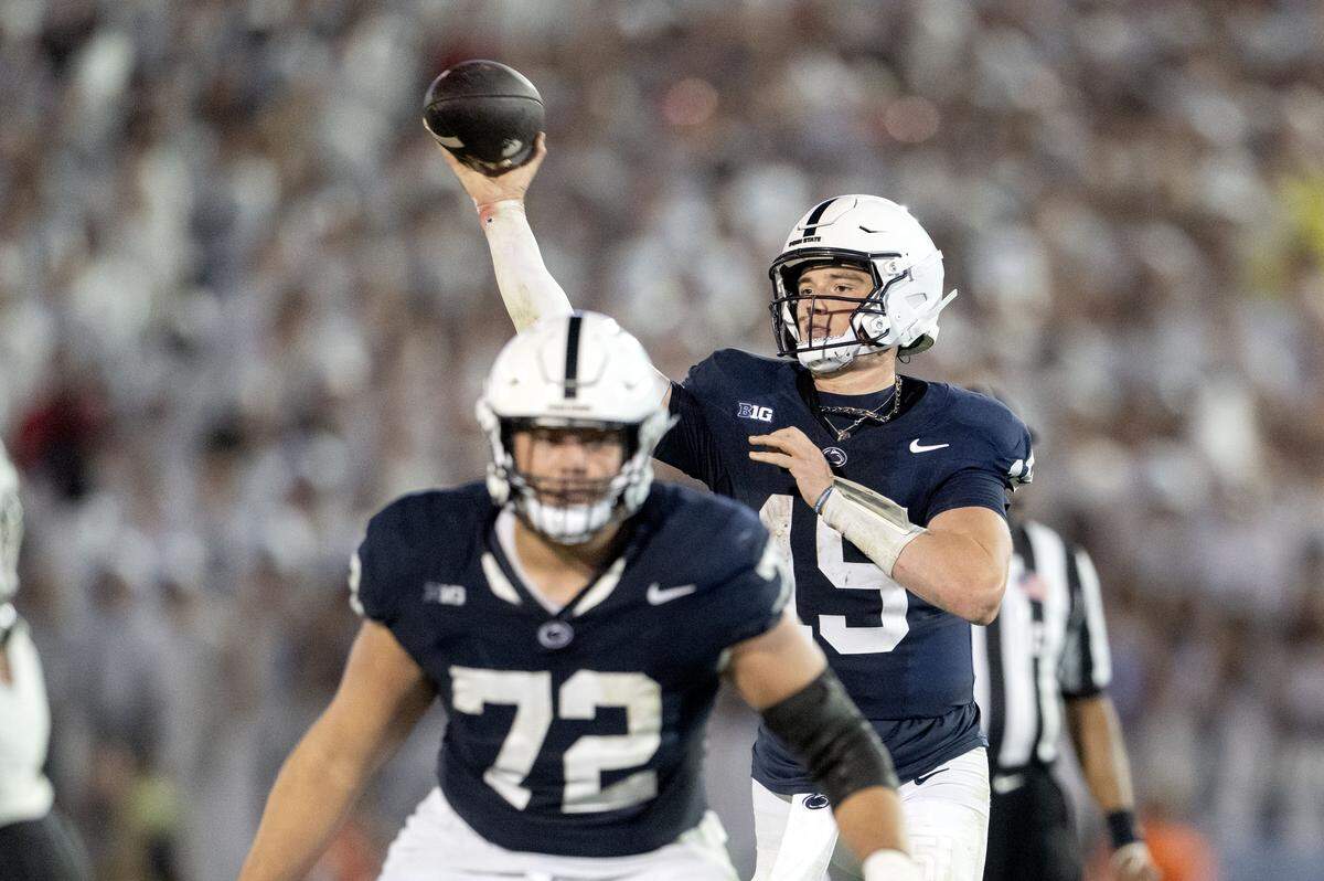 Penn State quarterback Drew Allar throws an interception in the second overtime to end the game against Oregon on Saturday, Sept. 27, 2025.