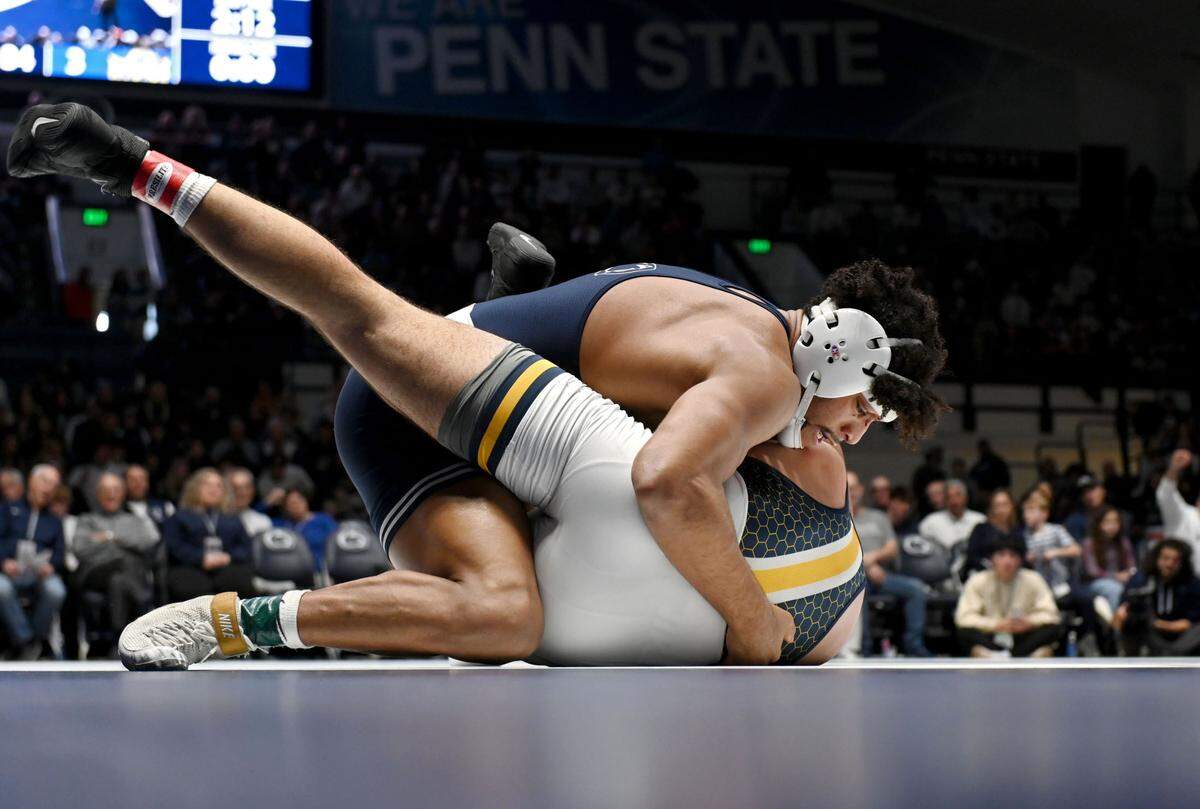 Penn State’s Carter Starocci controls Drexel’s Giuseppe Hoose in the 184 lb bout of the match on Sunday, Nov. 17, 2024 at Rec Hall. Starocci won by tech fall at 5:37.