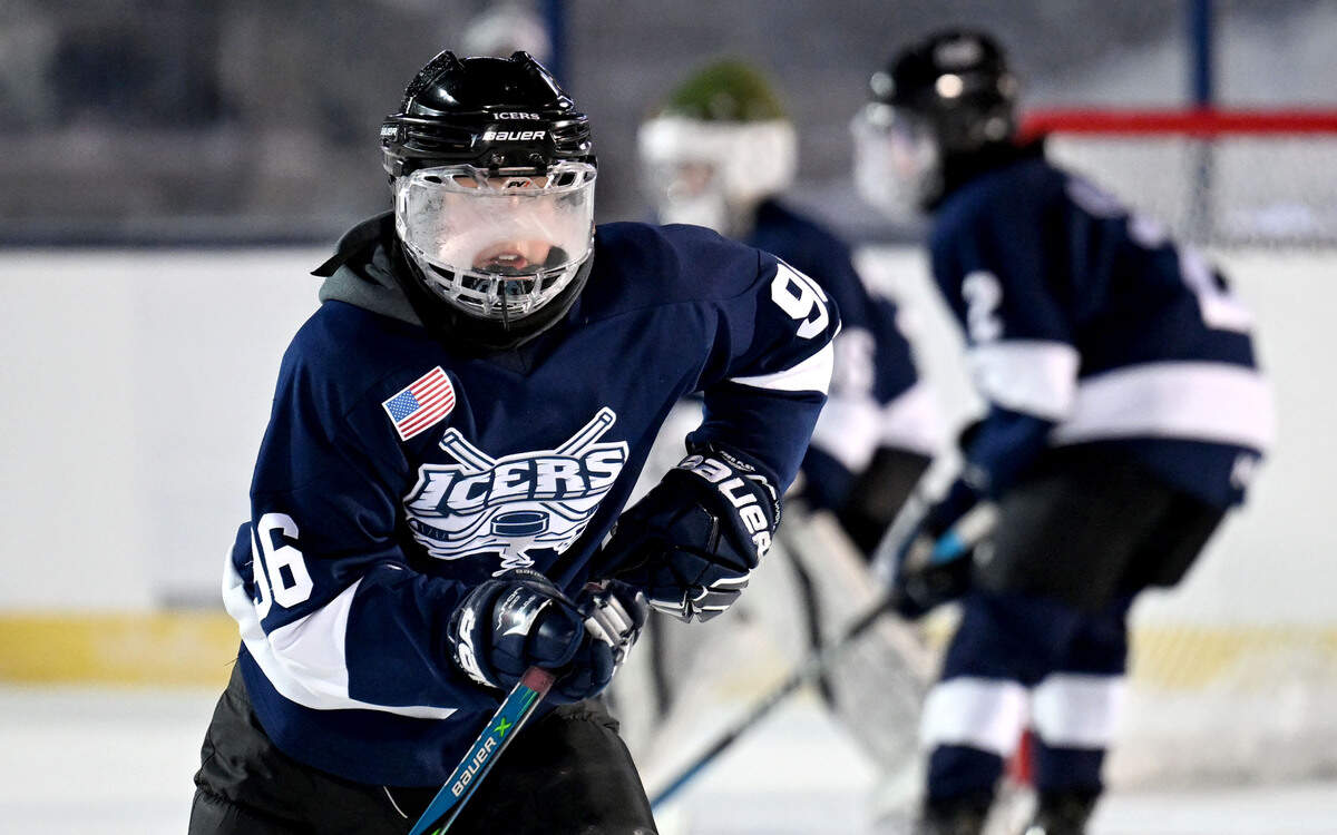 Greyson Medina’s face mask fogs as he skates off the ice at Beaver Stadium during a game with the Icers 12U team on Wednesday, Jan. 28, 2026.