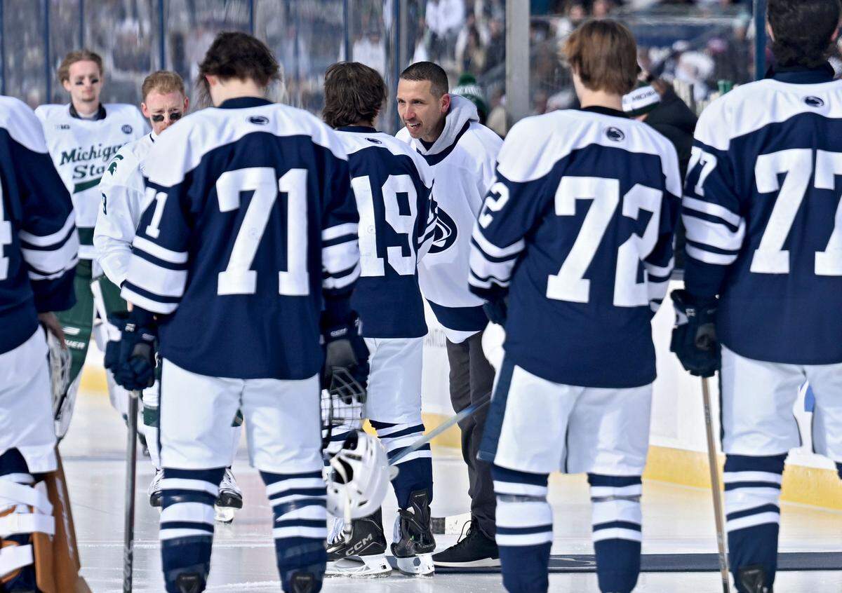 New Penn State football coach Matt Campbell does the ceremonial puck drop for the Penn State men’s hockey game against Michigan State at Beaver Stadium on Saturday, Jan. 31, 2026.