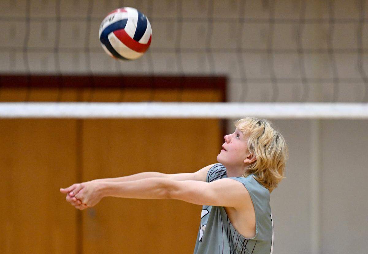 State College’s Lucas Keiter bumps the ball to a teammate during the boys volleyball game against Central Dauphin on Wednesday, May 10, 2023.