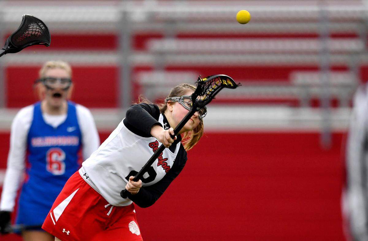 Bellefonte’s Molly McKee scores her 100th goal on an 8-meter shot during the game against Selinsgrove on Tuesday.