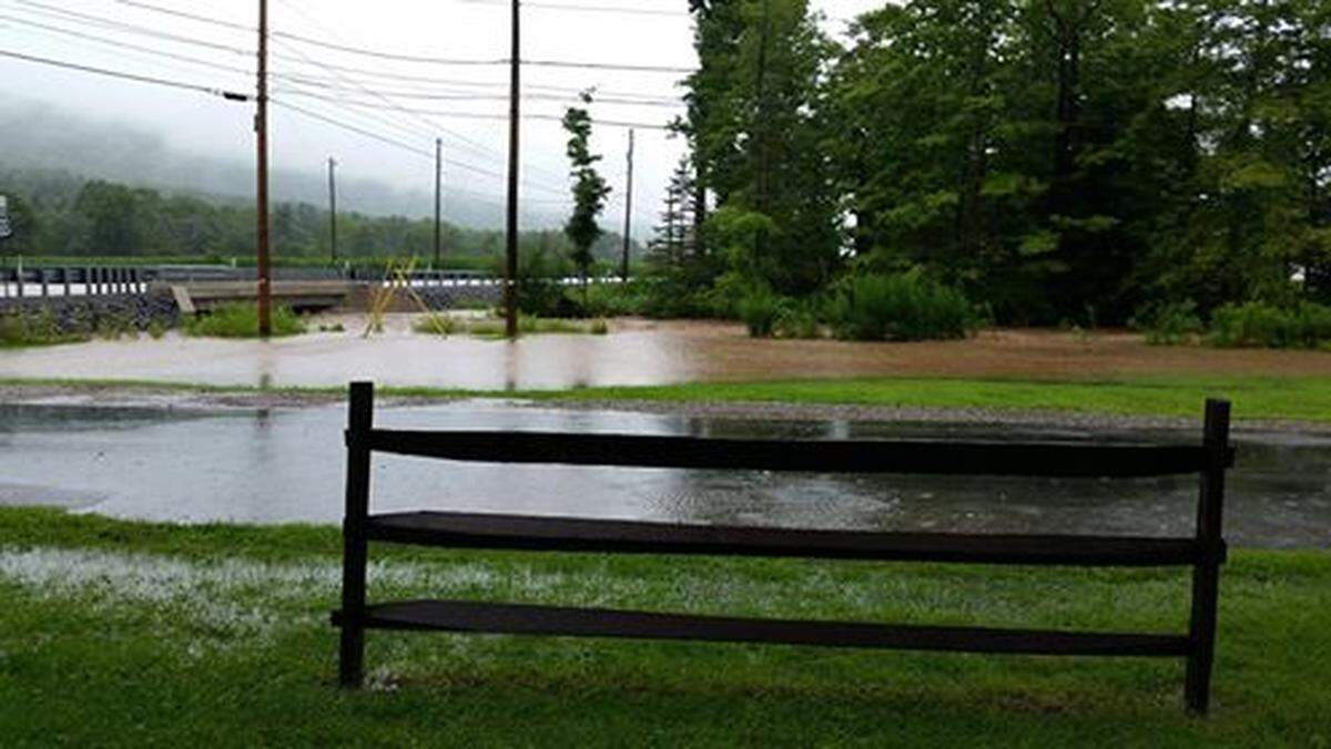 The water was almost to the top of the bridge on Old Route 220, Debbie reported.
