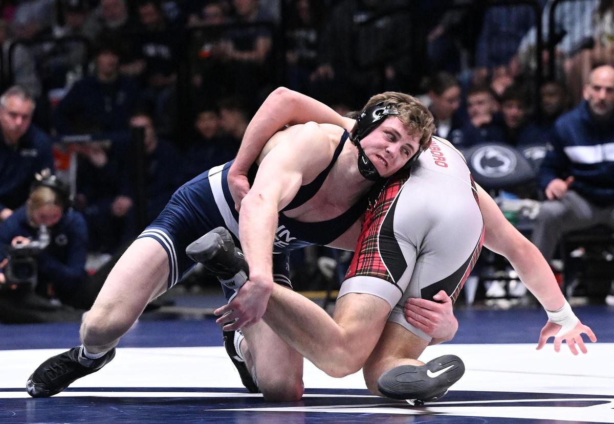 Penn State’s Bernie Truax takes down Edinboro’s Brody Evans at 184 pounds during Sunday’s final home wrestling meet at Rec Hall in University Park. Truax defeated Evans by tech fall. Penn State defeated Edinboro, 55-0.
