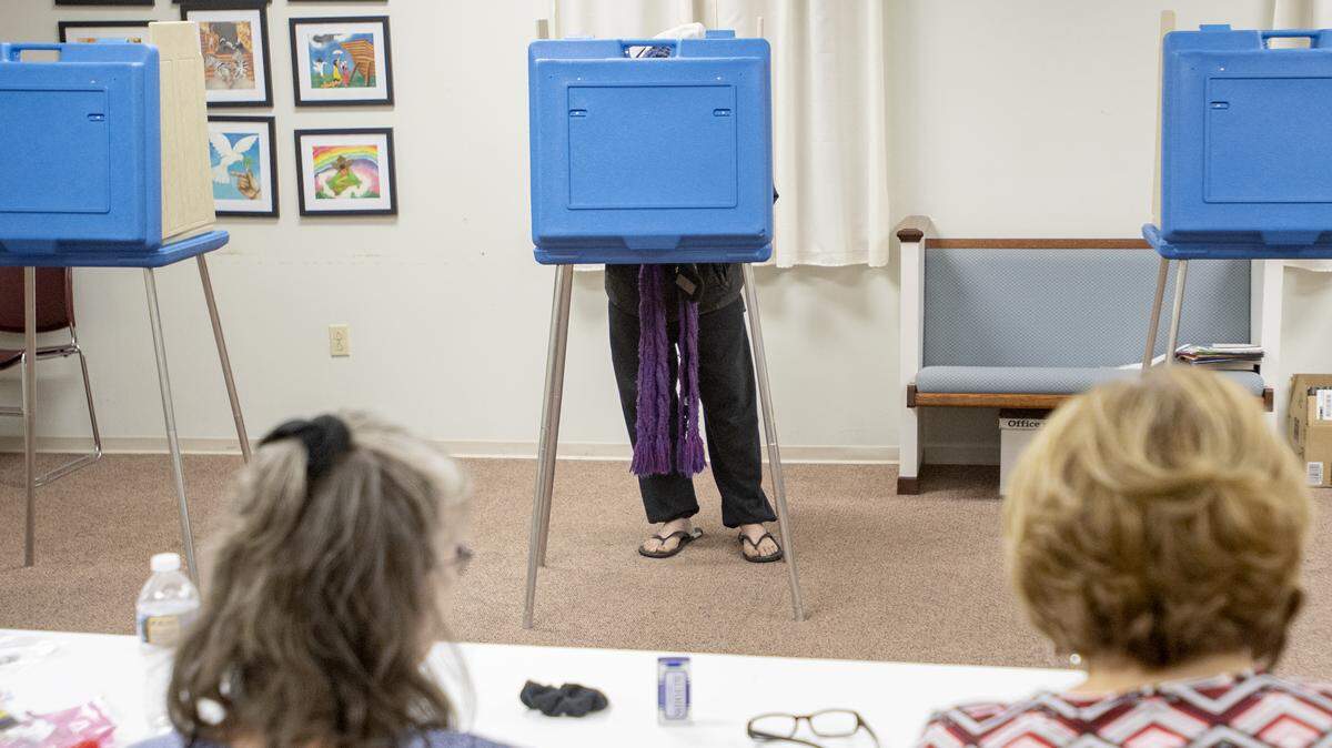 Volunteers help voters at Bellefonte Southeast, precinct 04 at Faith United Methodist Church on Election Day on Tues. Nov. 6, 2018.