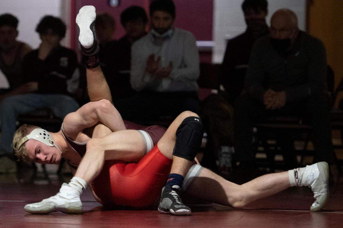 State High’s Pierson Manville pins Williamsport’s Gavin Reed during a PIAA wrestling bout between State High and Williamsport at State High gym on Monday Jan. 31, 2022 in State College, Pa. State College’s Manville pinned Williamsport’s Reed in :34.