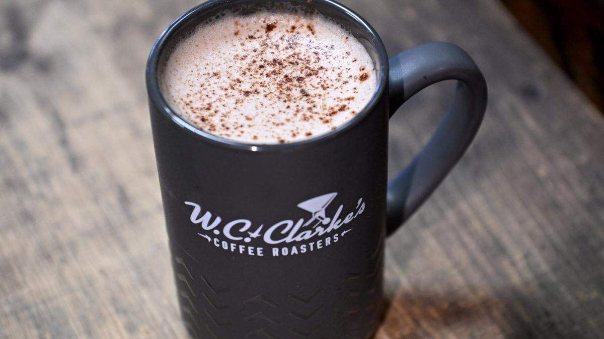 Hot chocolate from The Cheese Shoppe made with Vale Wood Farms whole milk and Ghirardelli cocoa powder, with a sprinkle of cocoa powder on top on Monday, Feb. 10, 2025.