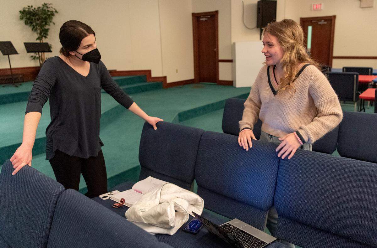 Rebecca Barker and Ava Moriarity talk about the program schedule and length during practice on Monday for “One Night For Change.”
