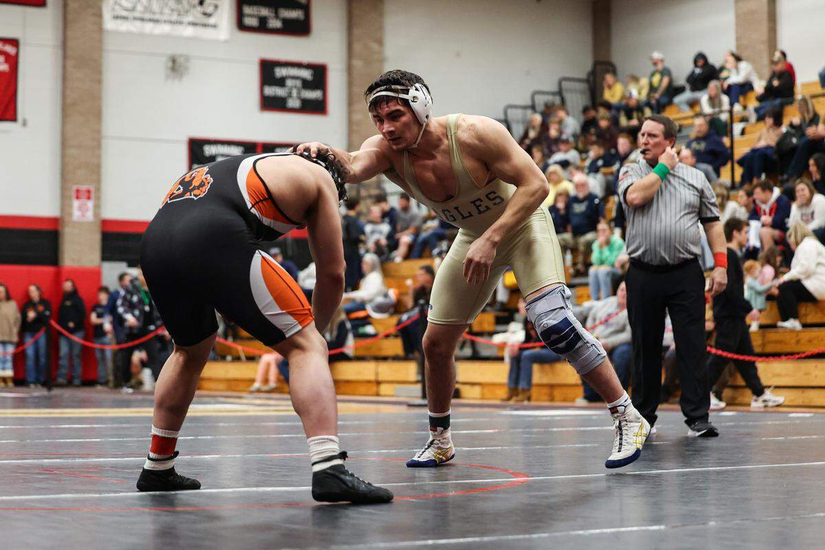 Bald Eagle Area’s Caleb Close looks for an opening on Tyrone’s Kyle Scott in their 189-pound finals match of the Laurel Highlands Athletic Conference championships on Jan. 4 at Central Cambria High School in Ebensburg. Close defeated Scott, 6-1.
