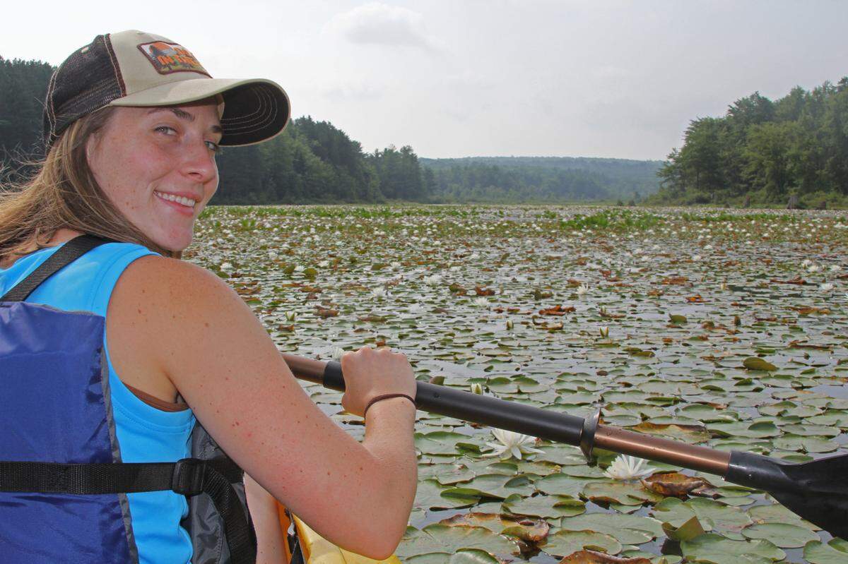 Lindera Nale paddles through the sea of water lilies at Black Moshannon State Park.