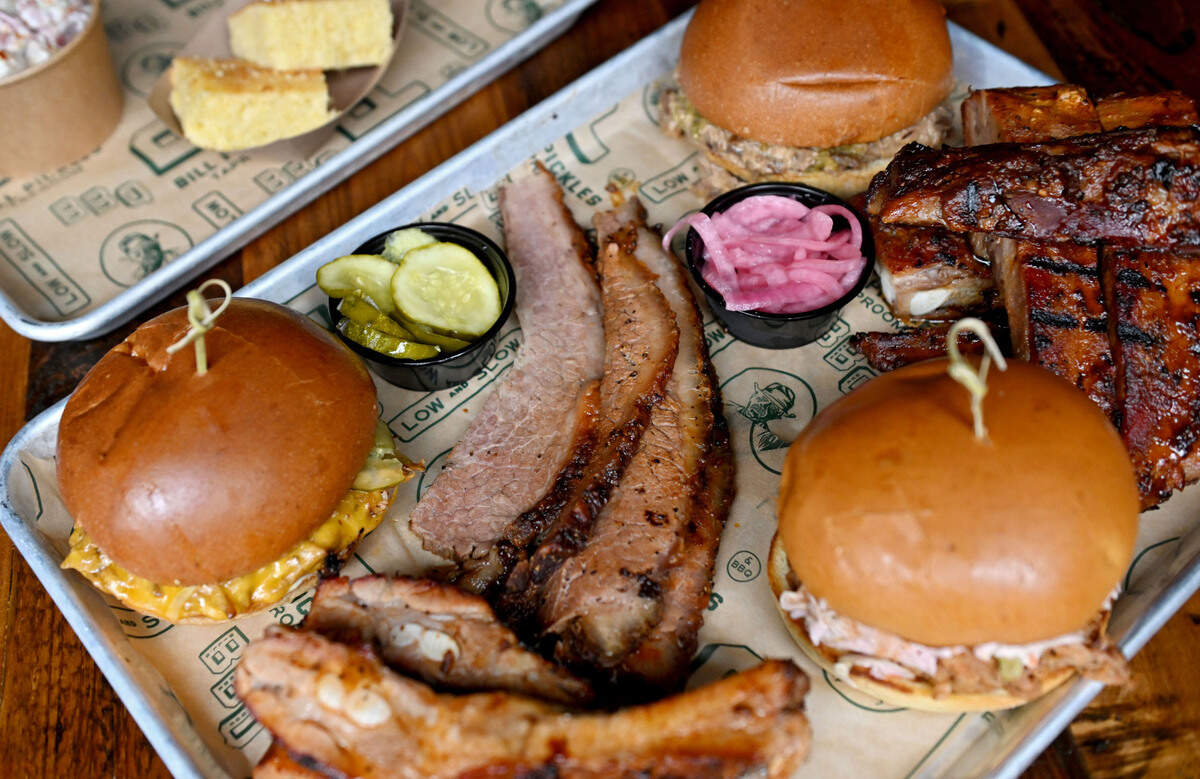 Beef brisket and a tray of barbecue from the new menu at Bill Pickles Tap Room on Wednesday, July 17, 2024.