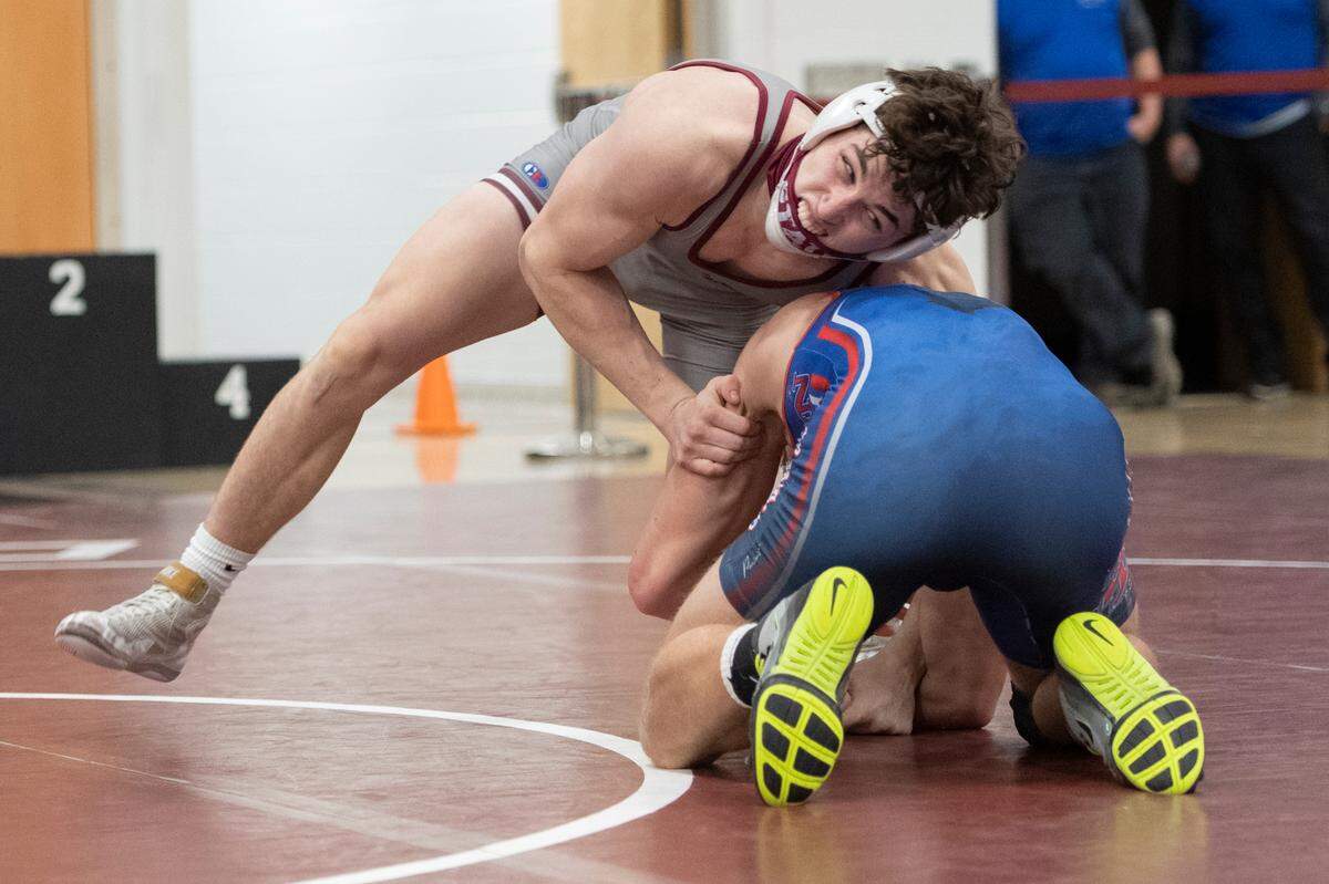 State College’s Lance Urbas wrestles St. Marys’ Nick Crisp during the PIAA NW AAA Regional Wrestling Tournament at Altoona Area High School on Feb. 27, 2021 in Altoona, PA.