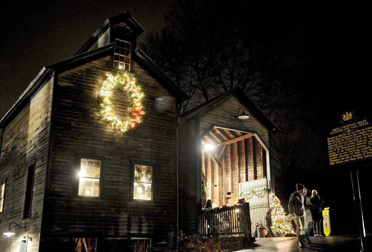 Visitors enjoy crafts and baked goods during the Lemont Village Association Christmas Market at the Granary in December 2013.