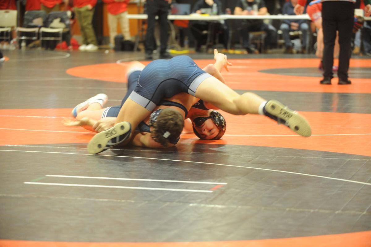 Penns Valley’s Ty Watson looks to pin Philipsburg-Osceola’s Nate Fleck in their 152-pound quarterfinals match of the Laurel Highlands Athletic Conference tournament on Friday at Tyrone. Watson did pin Fleck in 1:02.