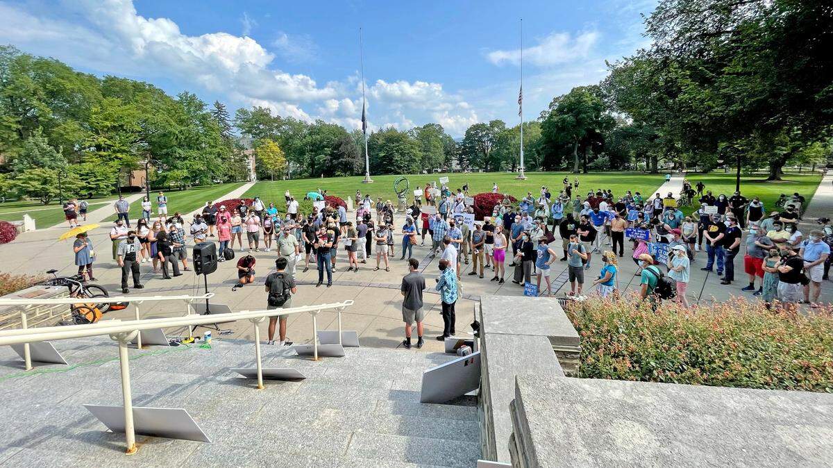 About 150 people attended a rally at Old Main on Aug. 27 to call on Penn State to require a COVID-19 mandate for students and staff.