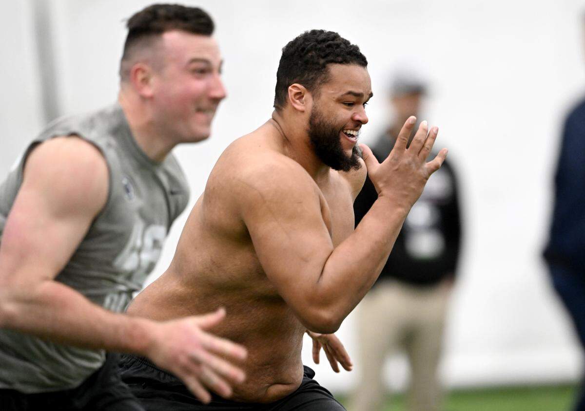 Defensive tackle PJ Mustipher runs a position drill during Penn State football’s Pro Day on Friday, March 24, 2023.