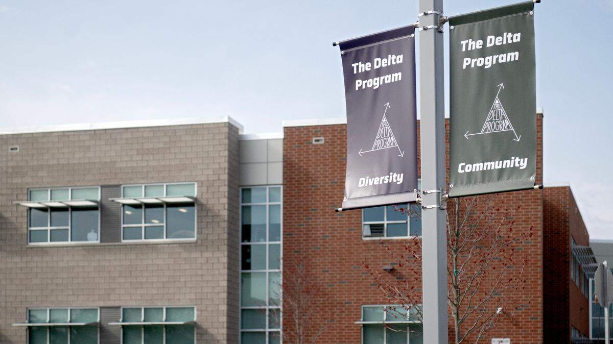 Signs promoting the Delta Program hang outside of the north building at State College Area High School on Thursday, March 14, 2024.