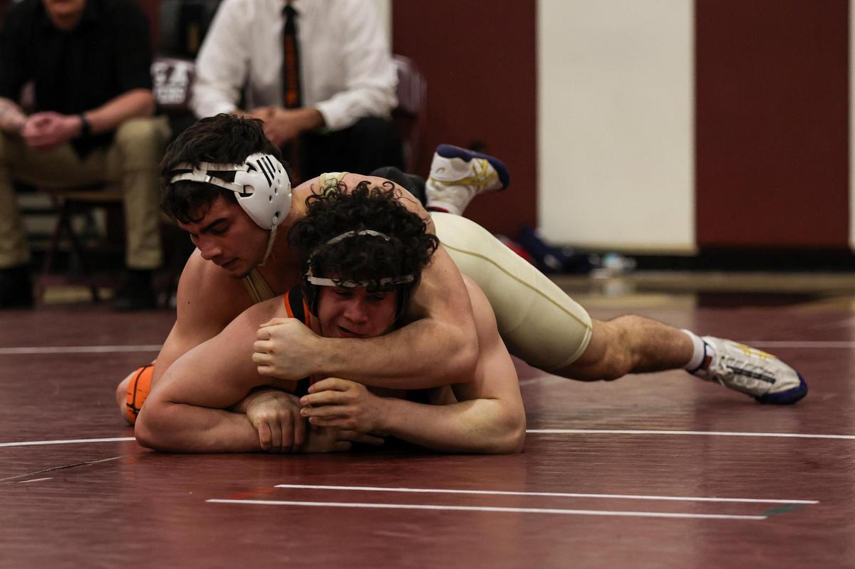 Bald Eagle Area’s Caleb Close controls Tyrone’s Kyle Scott in their 189 pound finals match of the PIAA Class 2A Southwest Regional on Saturday in Altoona. Close topped Scott, 14-9.
