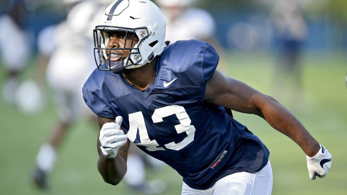 Penn State linebacker Manny Bowen runs towards the ball in a play at practice on Wednesday, August 15, 2018.  