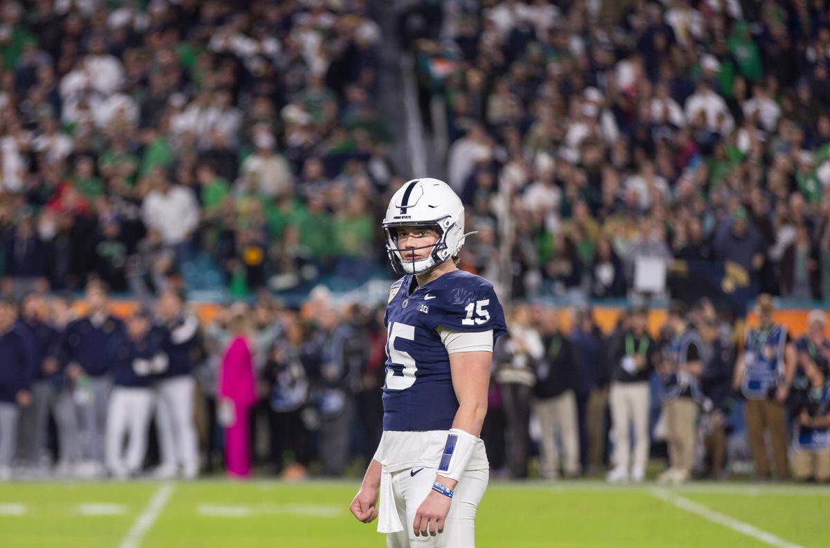 Penn State Nittany Lions quarterback Drew Allar (15) reacts  on the field in the second half of his College Football Playoff Semifinal Capital One Orange Bowl game against the Notre Dame Fighting Irish at Hard Rock Stadium on Thursday, Jan. 9, 2025, in Miami Gardens, Fla.