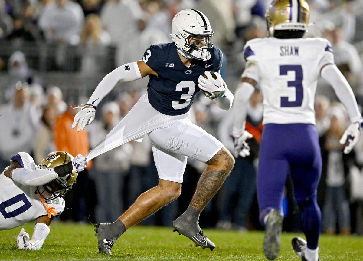 Washington cornerback Leroy Bryant can’t stop Penn State wide receiver Julian Fleming as he runs in for a touchdown during the game on Saturday, Nov. 9, 2024.