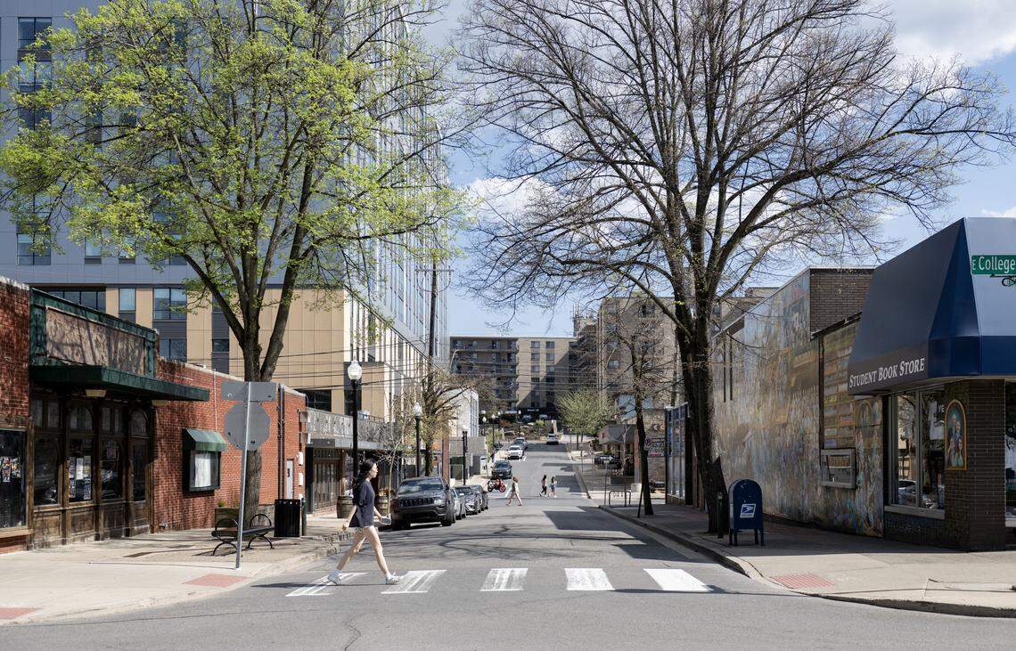 People cross Hiester Street on Thursday, April 16, 2026. The Downtown State College Improvement District will close the road and create “East End Social” for the summer.