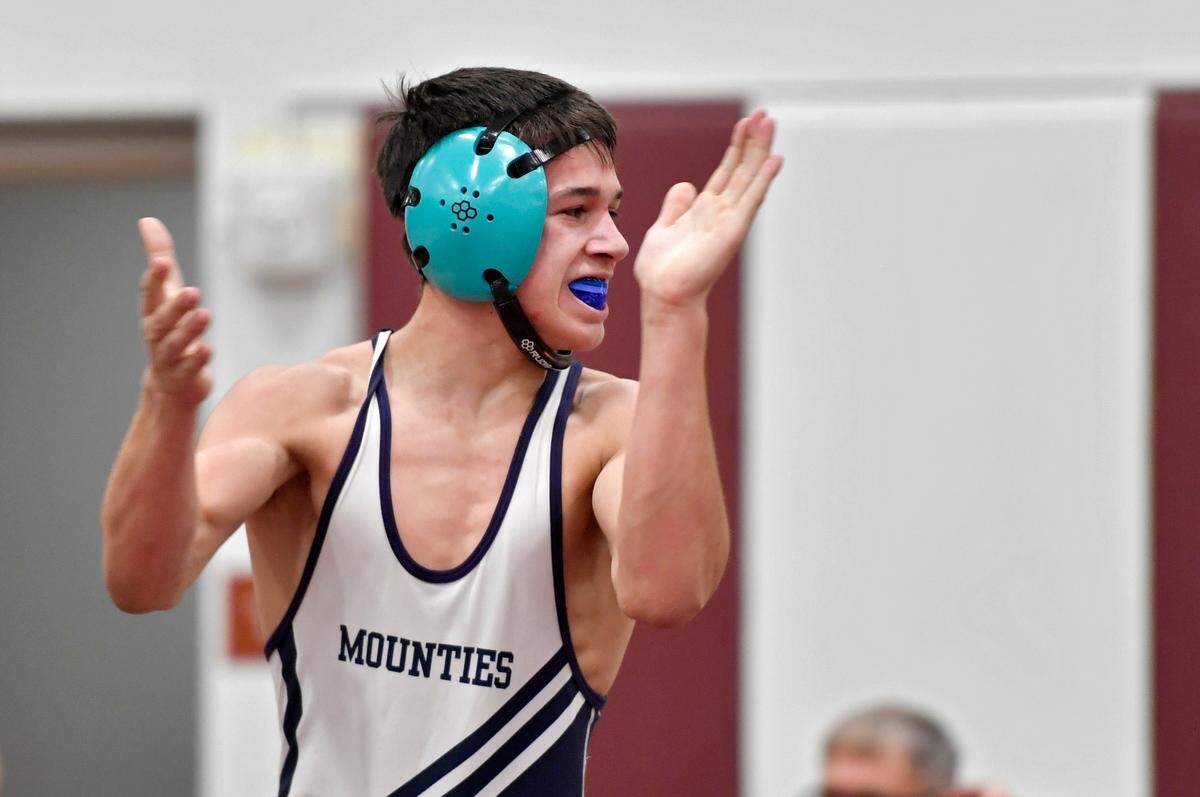 Philipsburg-Osceola’s Marcus Gable celebrates his win over Tyrone’s Ashton Sipes in the 132 lb championship bout of the District 6 2A tournament on Saturday, Feb. 19, 2022.