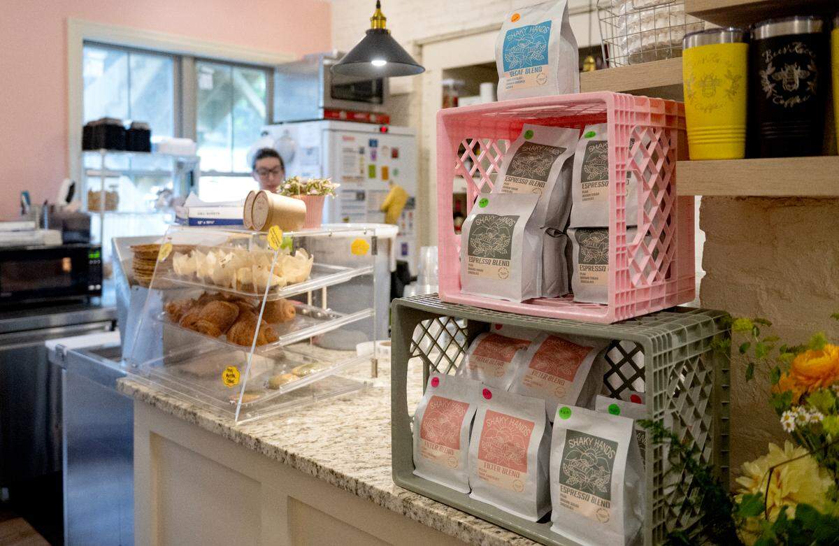 Coffee beans and baked goods on sale at Shaky Hands Coffee Shop on Tuesday, June 10, 2025. 