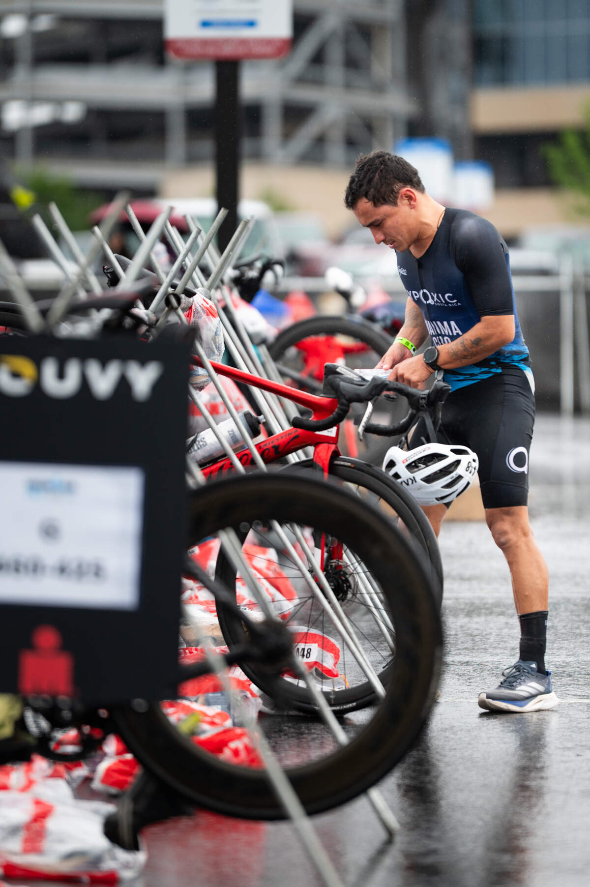 An athlete prepares to transition from biking to running during the Ironman 70.3 Happy Valley on Sunday, June 15, 2025 in State College, Pa.