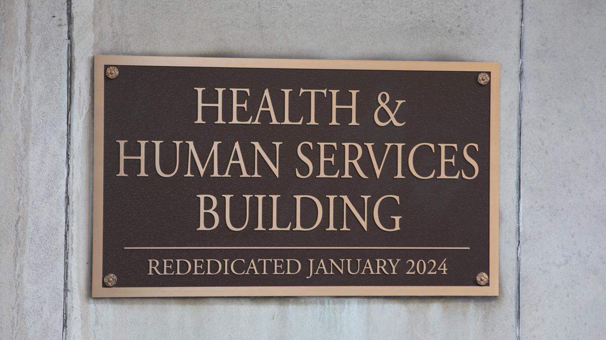 A placard outside the Pennsylvania Health & Human Services building in Harrisburg.