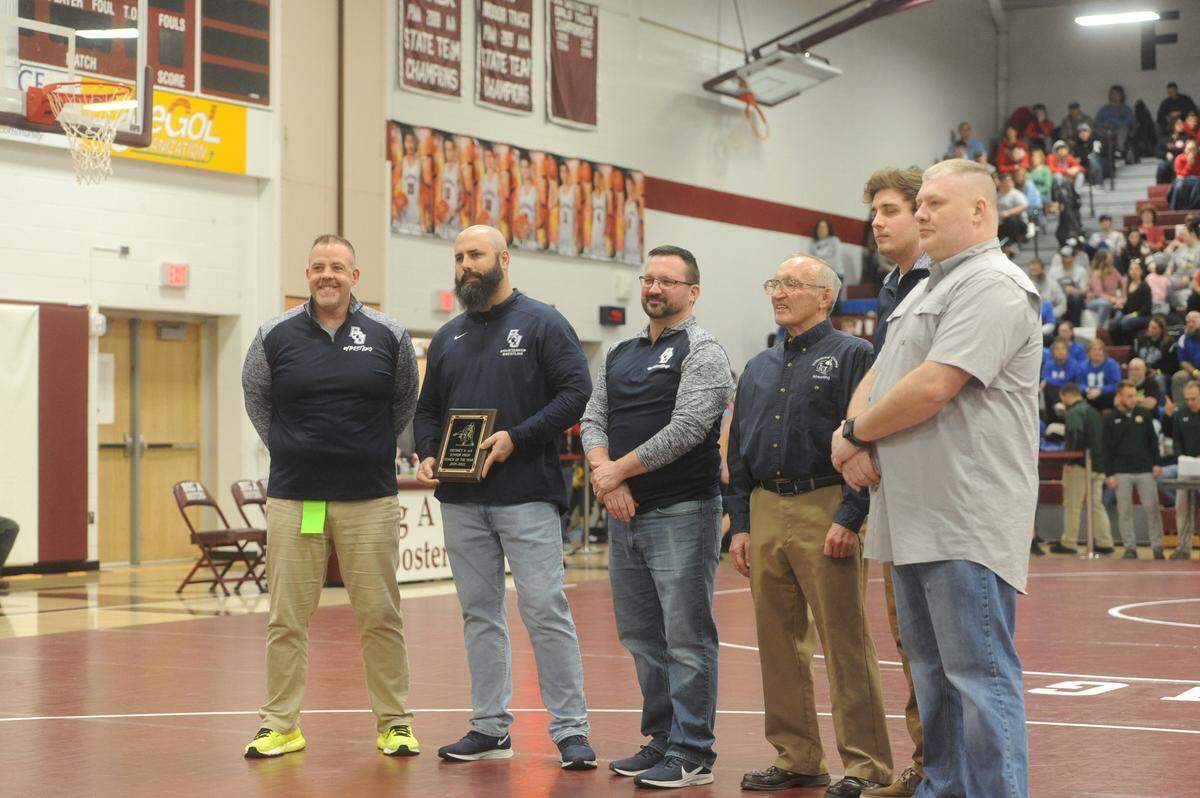 Philipsburg-Osecola junior high coach Corey Wood (second from left) was named the District 6 Class 2A junior high coach of the year.