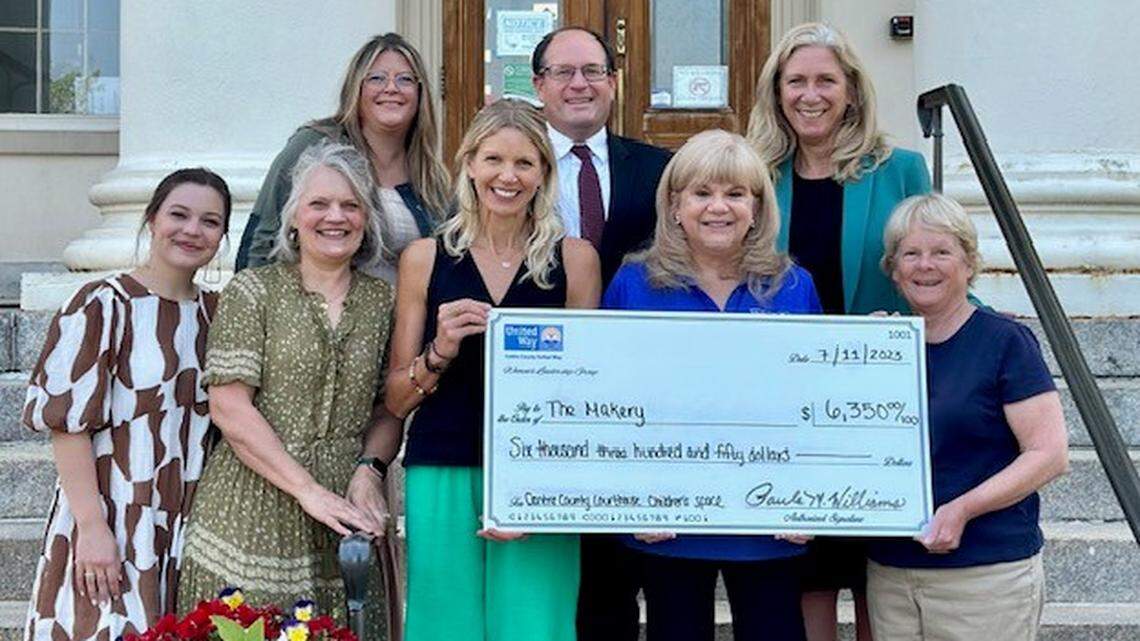 The Makery was awarded a grant from the Women United group to make a Children’s Space at the Centre County Courthouse. Pictured in the first row, from left: Grace Cousins, Lisa Cousins, Amy Frank (all from The Makery), Centre County United Way Executive Director Paula Williams and Women United Chair Barbara Sherlock. In the second row, from left: Theresa Kieffer of the Centre County Youth Service Bureau, Judge Brian Marshall and Judge Katie Oliver.