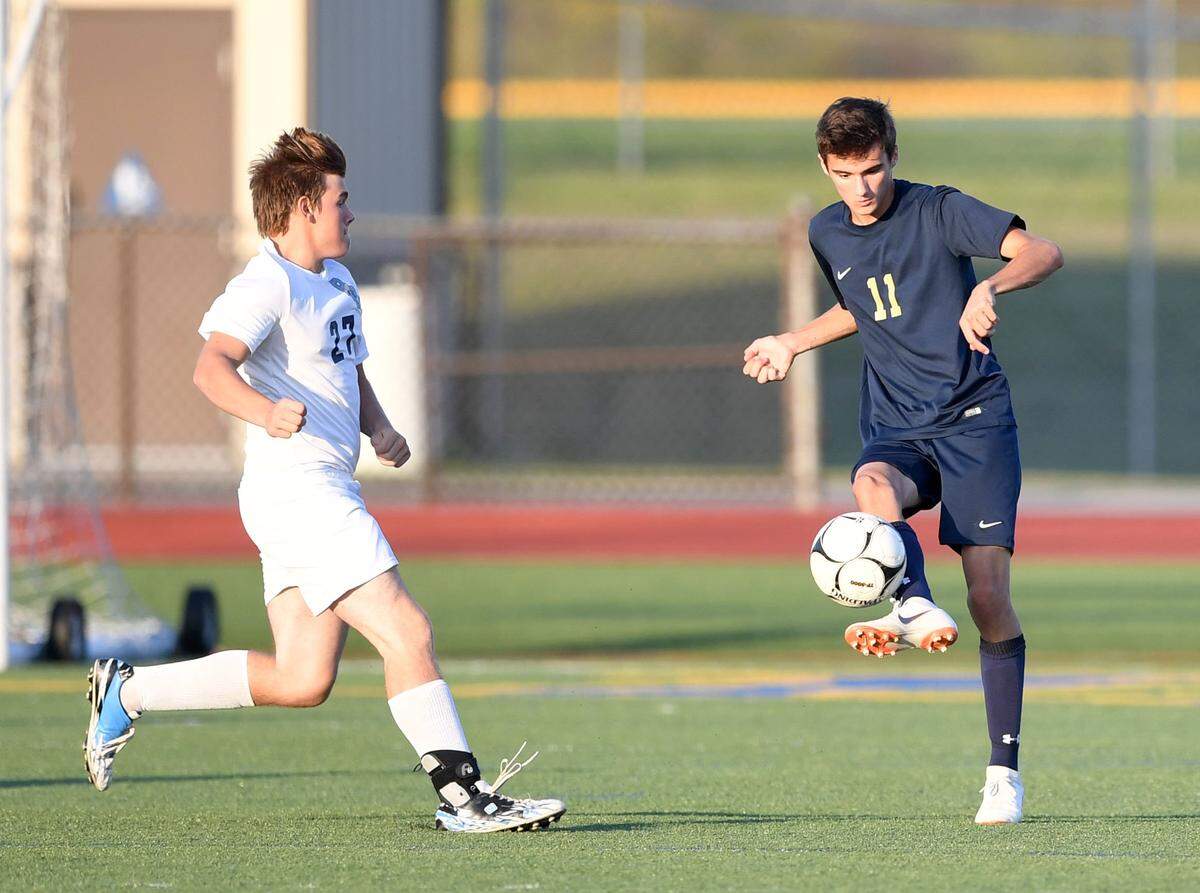 Bald Eagle Area defender Judah Eveleth dribbles the ball during a game against Philipsburg-Osceola in 2018 at Bald Eagle Area High School.