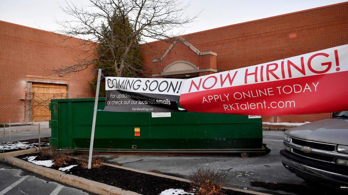 “Now hiring” signs for Rural King hang outside of the store’s future location at the Nittany Mall. The store plans to move into the space that was previously Sears.