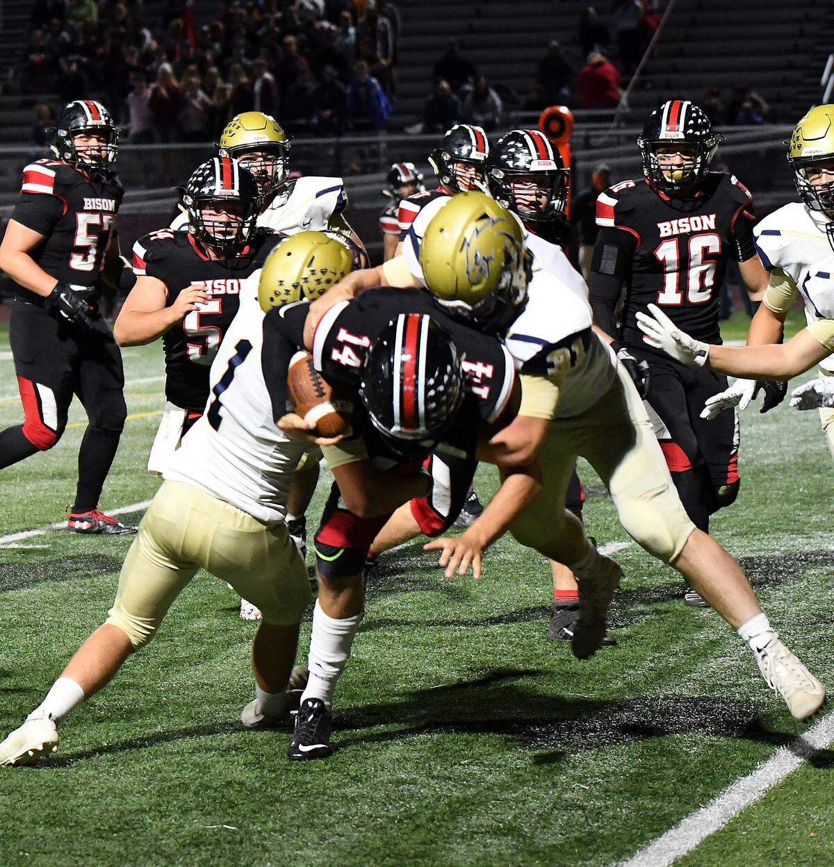 Clearfield quarterback Oliver Billotte is stopped by Bald Eagle Area defenders Friday night. BEA won 36-28.