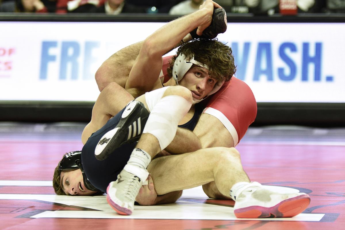 Penn State’s Levi Haines scrambles with Rutgers’ Andrew Clark in their 157-pound bout of the Nittany Lions’ 33-8 win on Friday, Feb. 10, 2023 in Piscataway, N.J. Haines took care of Clark, 8-2, for his sixth straight ranked win.