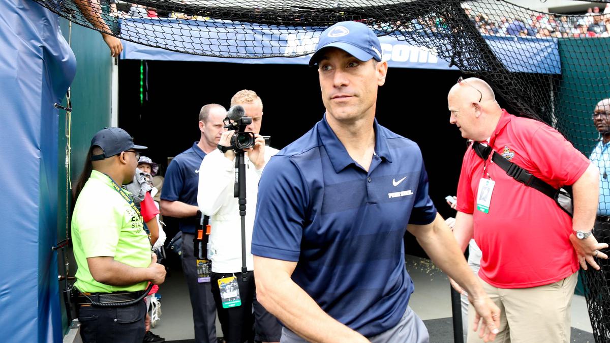 Penn State lacrosse head coach Jeff Tambroni enters the field at Lincoln Financial Field prior to the NCAA semifinal game against Yale on Saturday, May 25, 2019.