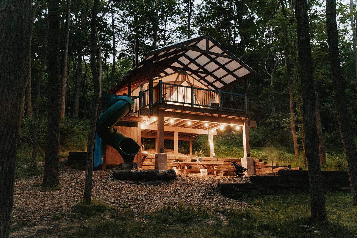 The Cardinal campsites are built into the mountainside and have a slide from the platform to the ground.