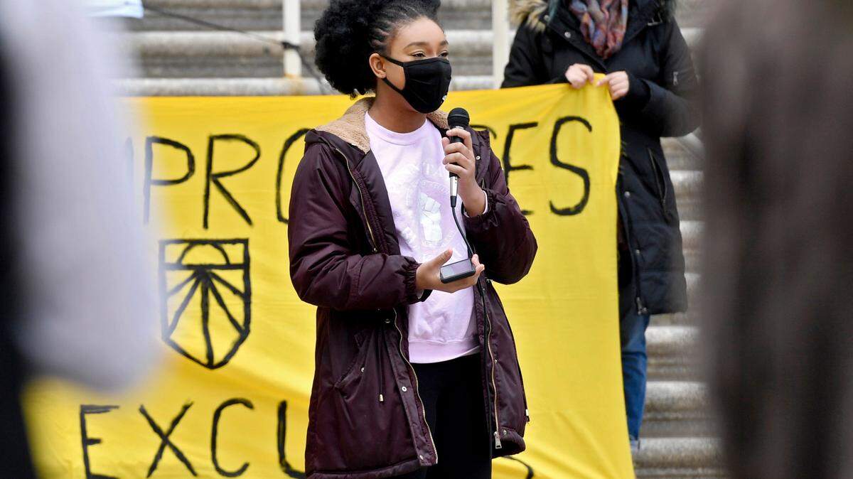 Nyla Holland, Penn State’s Black Caucus president, speaks during the Earth Day strike organized by State College Sunrise Movement, PSU Climate Action and PSU Eco Action in front of Old Main on April 22. Holland will help lead a rally/march at 4 p.m. Friday at Beaver Stadium to promote racial justice and honor the 20th anniversary of “The Village.”