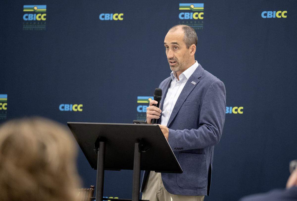 Michael Stefan from Penn State speaks during the State College Air Service Summit on Tuesday, Oct. 14, 2025 at a hangar at the State College Regional Airport. 