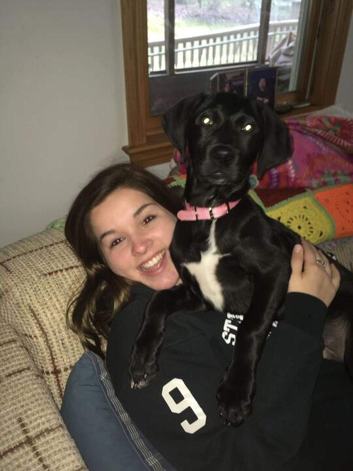 An undated photo of Kayte Derhammer with her dog Remi.