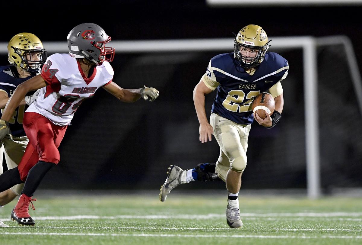 Bald Eagle Area’s Gage McClenahan cuts down the field with the ball from Central defenders during the game on Friday, Spet. 20, 2019.
